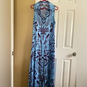 Sleeveless button down dress. Floor length.